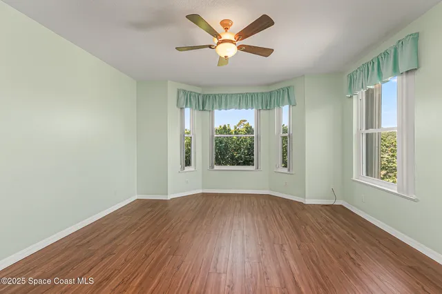 an aerial view of a swimming pool patio swimming pool and outdoor seating