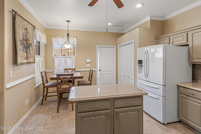 an aerial view of a house with outdoor space