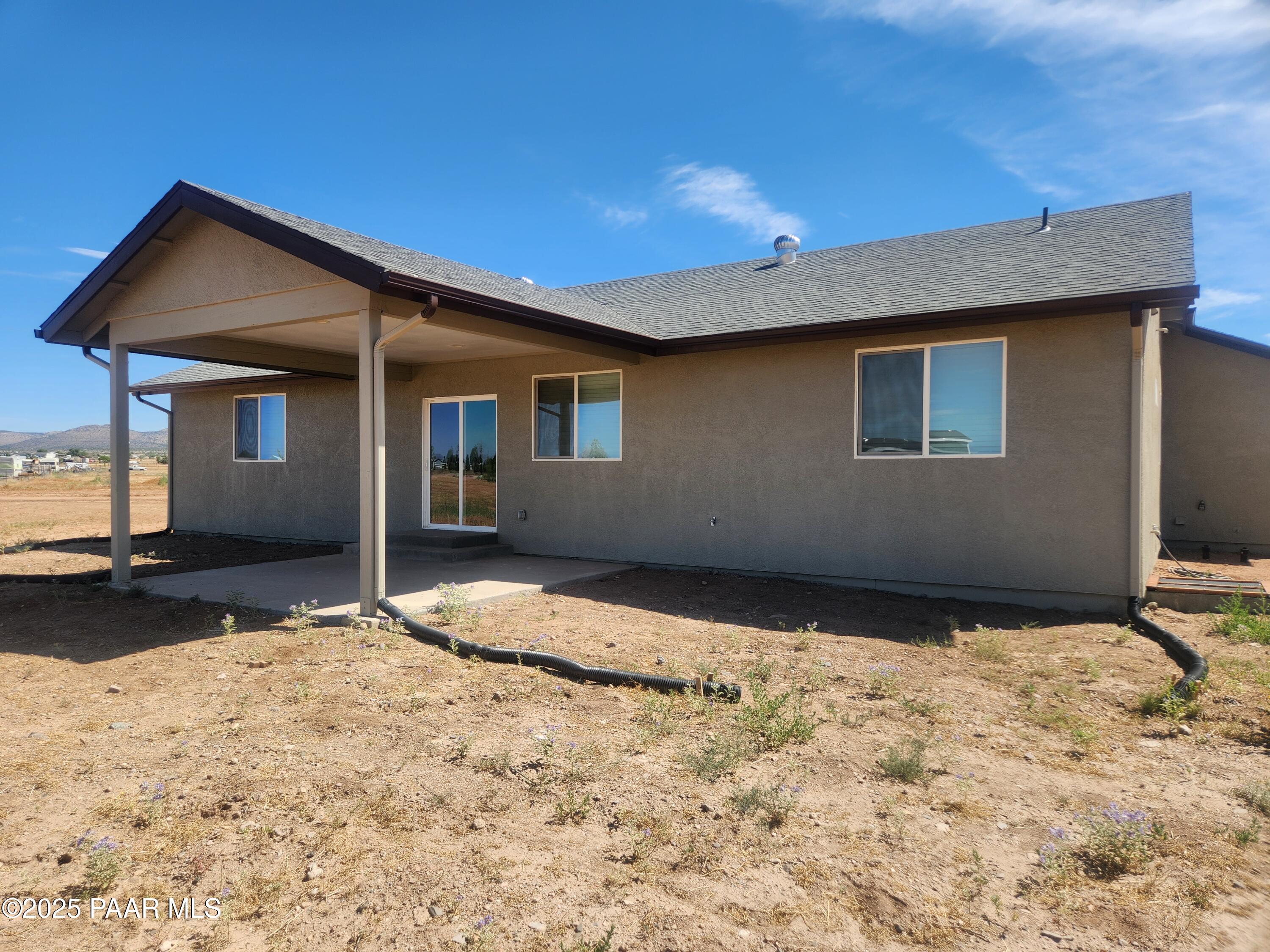 895 Ranch House Road Paulden, AZ 86334 - Photo 13 of 21 a backyard of a house