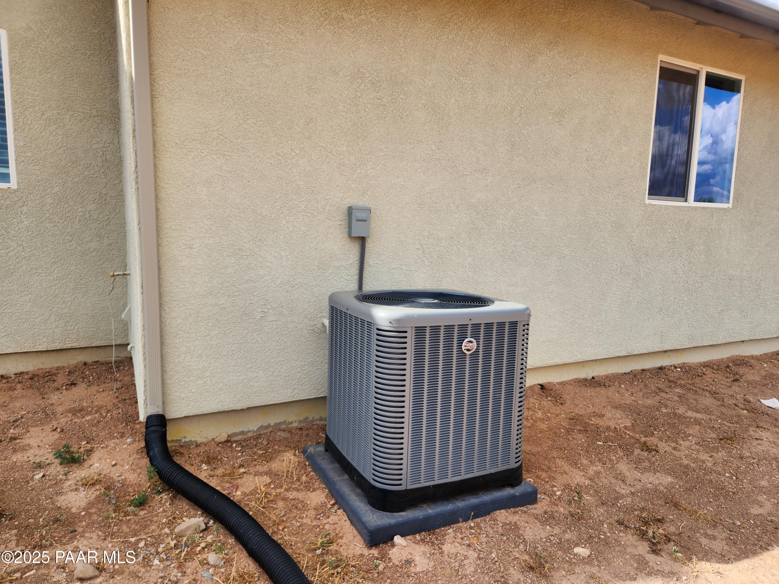895 Ranch House Road Paulden, AZ 86334 - Photo 18 of 21 a view of a room with wooden floor and bench