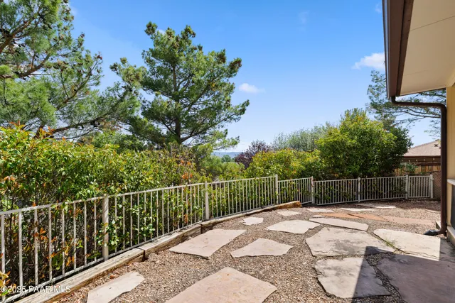 a view of balcony with wooden floor