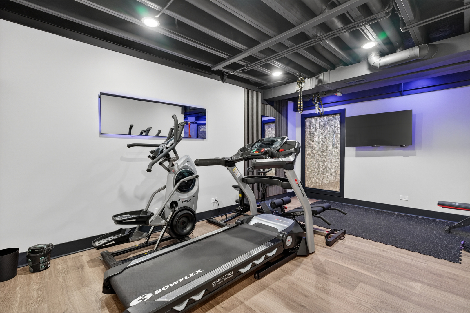 16230 Lake View Road Plainfield, IL 60586 - Photo 45 of 62 a room with gym equipment