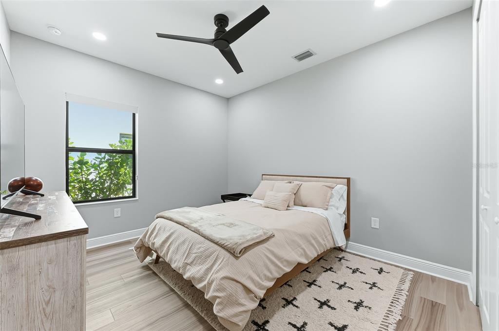 4191 Pegasus Way Naples, FL 34120 - Photo 26 of 48 a bedroom with a bed and a window