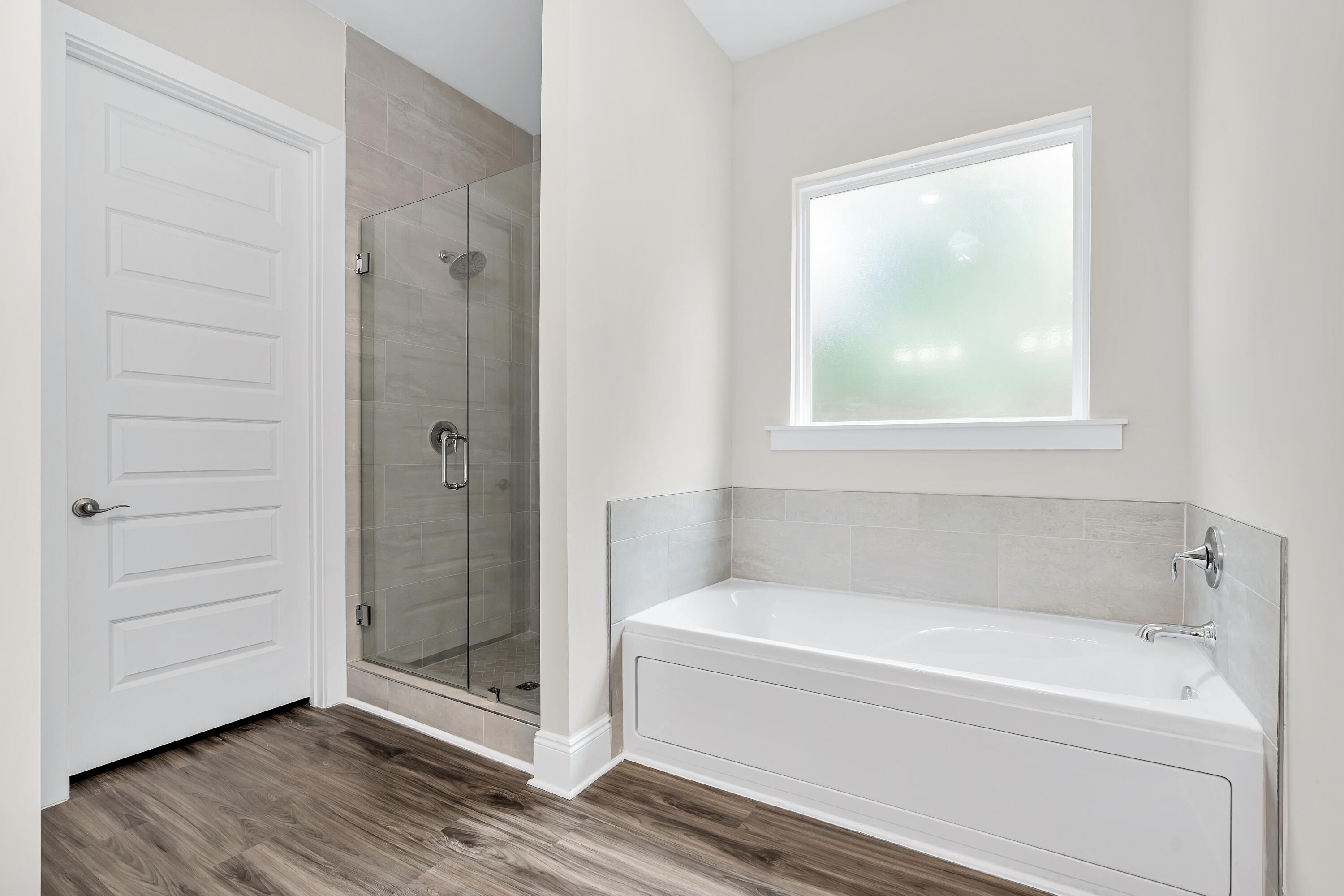 0 South J Hunter's Way, Unit LOT 18 Freeport, FL 32439 - Photo 21 of 36 a white bath tub sitting next to a shower