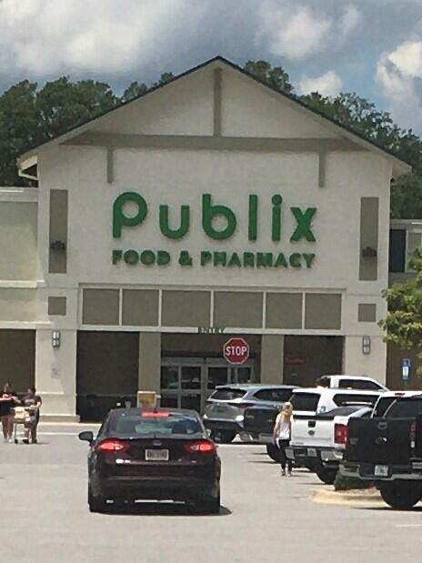 0 South J Hunter's Way, Unit LOT 18 Freeport, FL 32439 - Photo 34 of 36 a car parked in front of a house