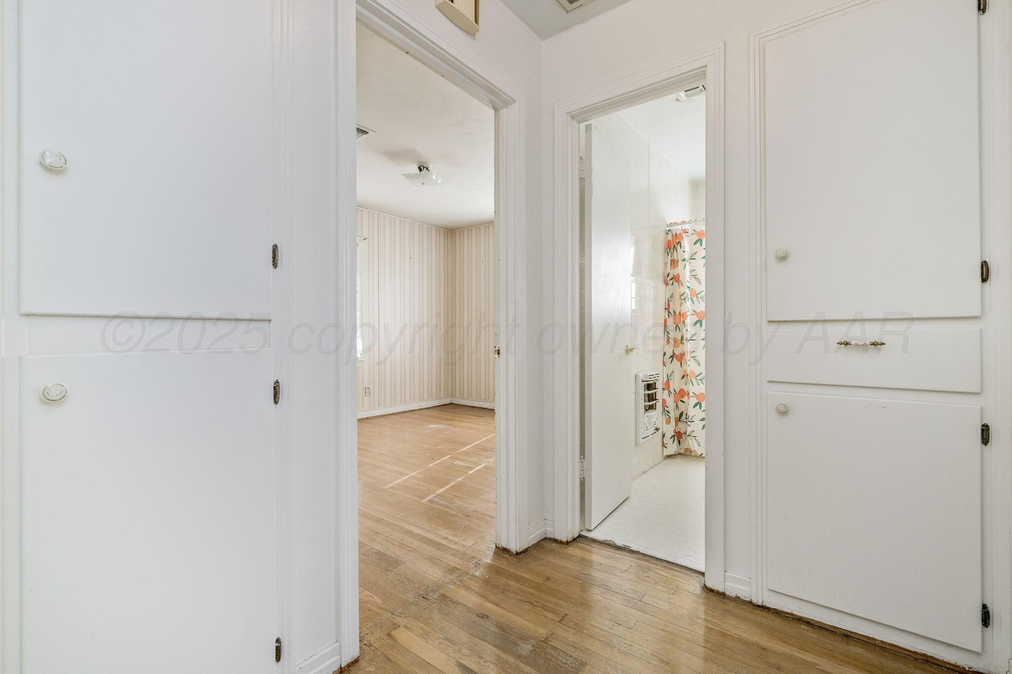 2133 Hamilton Street Pampa, TX 79065 - Photo 17 of 21 wooden floor in an empty room
