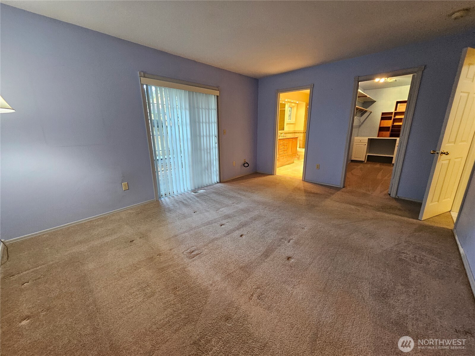 1121 East Old Ranch Road Allyn, WA 98524 - Photo 14 of 30 an empty room with windows and closet