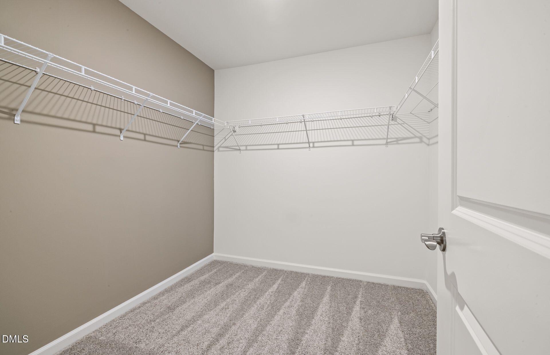 101 Verlands Way Garner, NC 27529 - Photo 12 of 19 a view of a room with racks on the wall