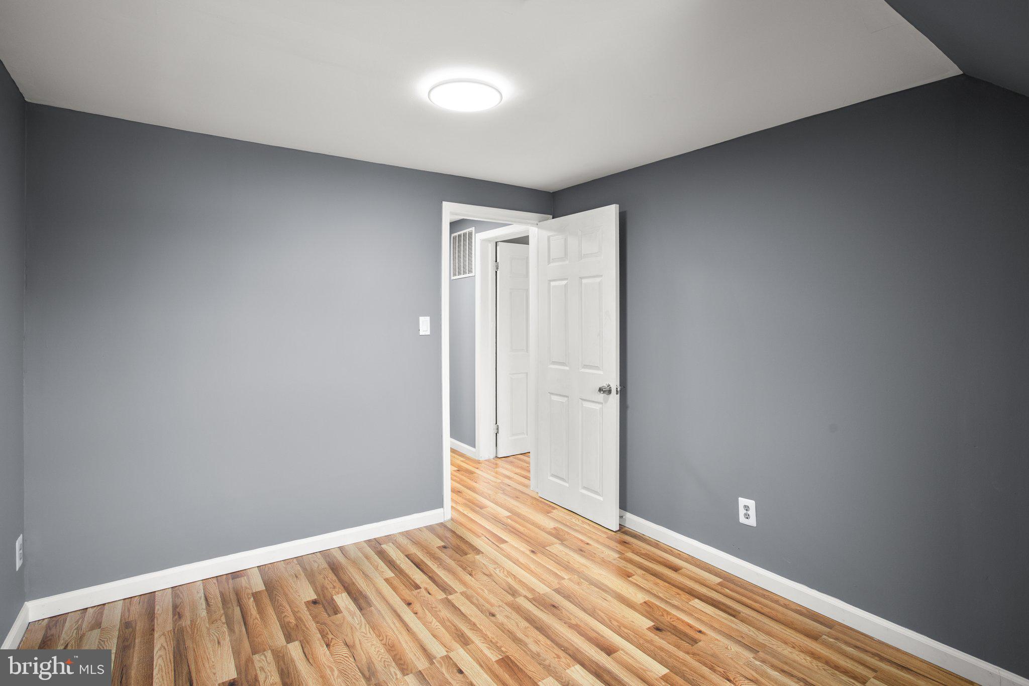 1251 Sulphur Spring Road Baltimore, MD 21227 - Photo 19 of 30 Upper Level Bedroom Three