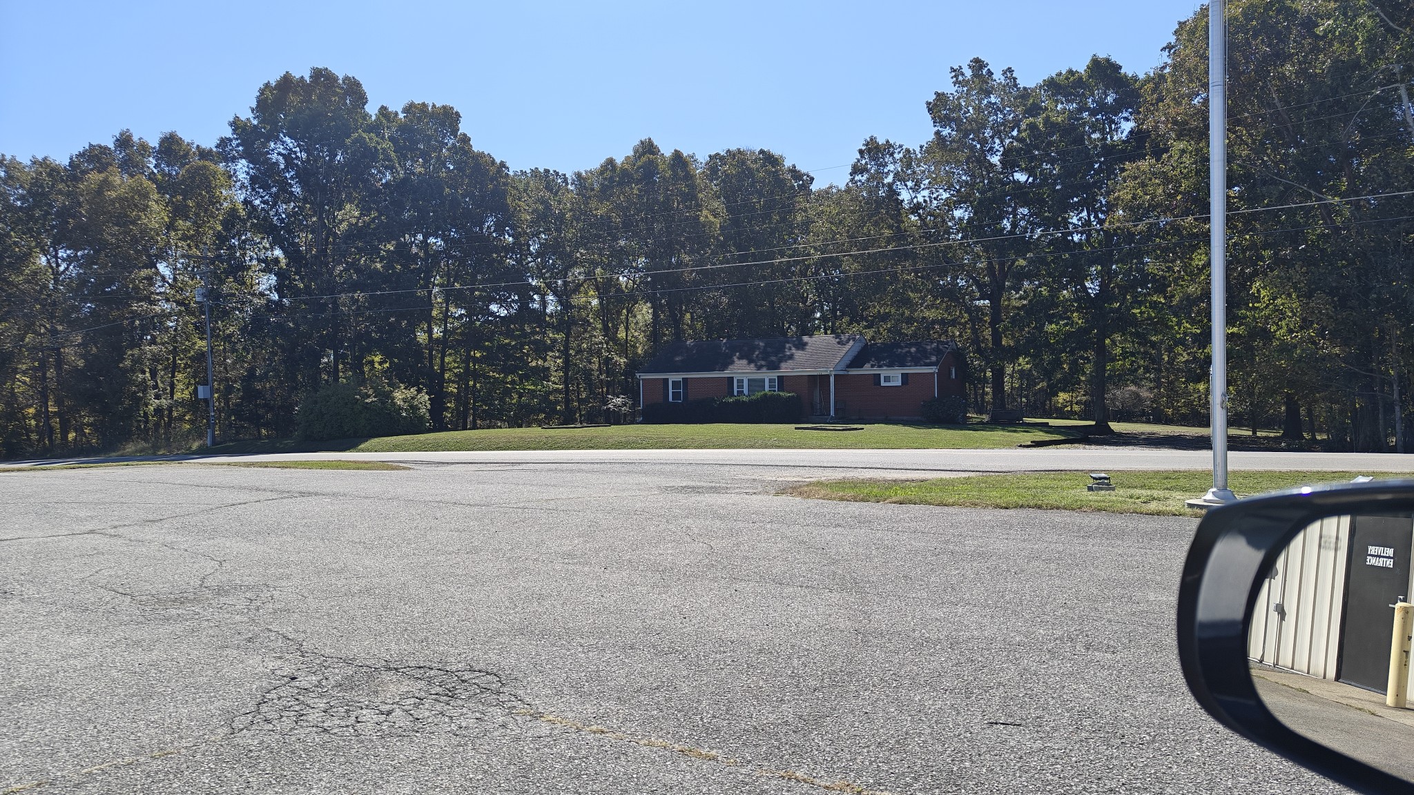 150 Sylvis Road Dickson, TN 37055 - Photo 2 of 61 a view of a swimming pool with a yard and large trees