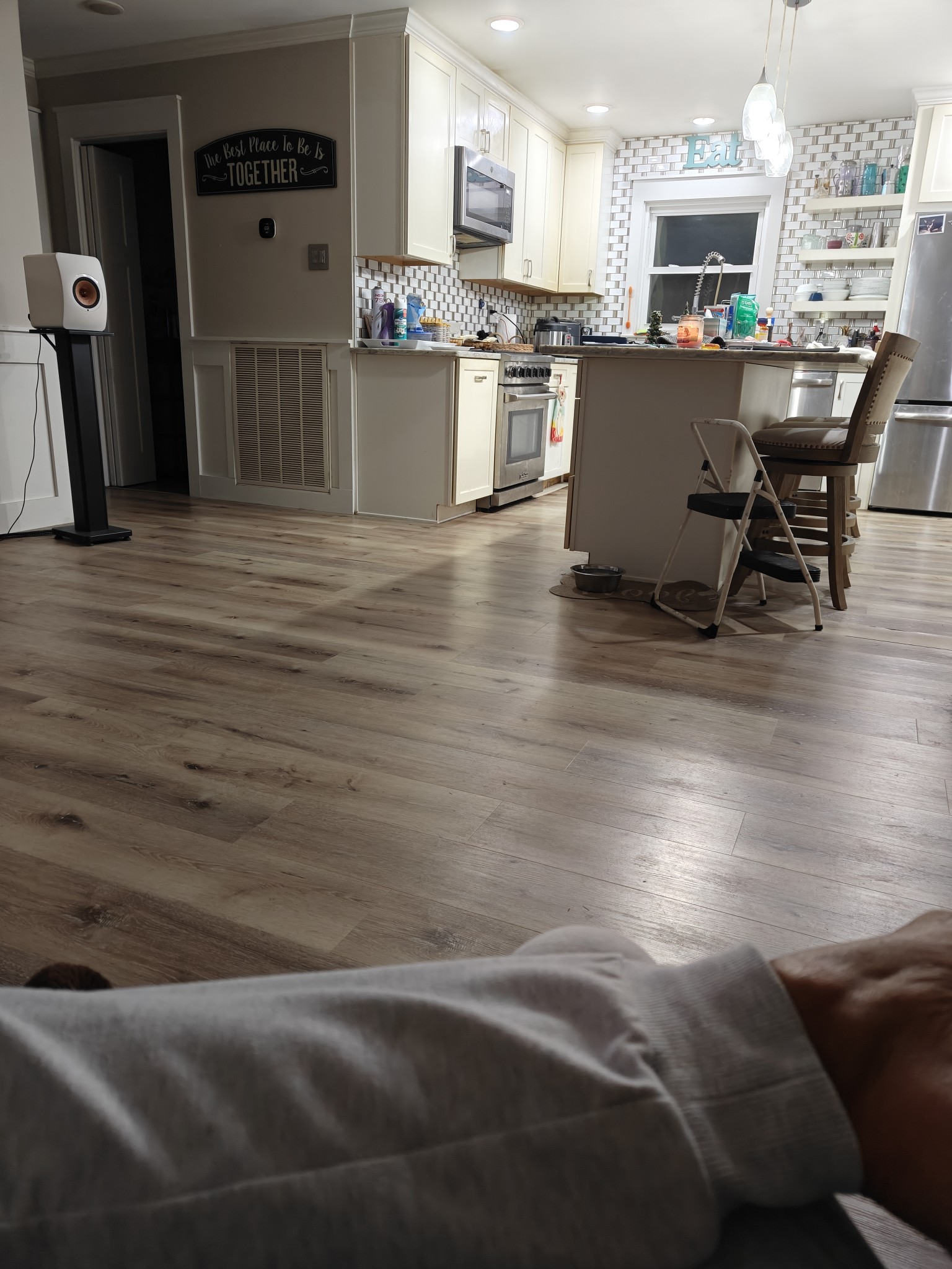 150 Sylvis Road Dickson, TN 37055 - Photo 21 of 61 a kitchen with stainless steel appliances kitchen island granite countertop a refrigerator a stove top oven a dining table and chairs with wooden floor