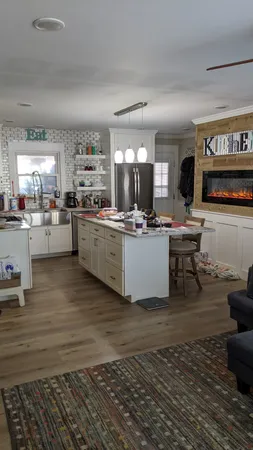 a backyard of a house with large trees