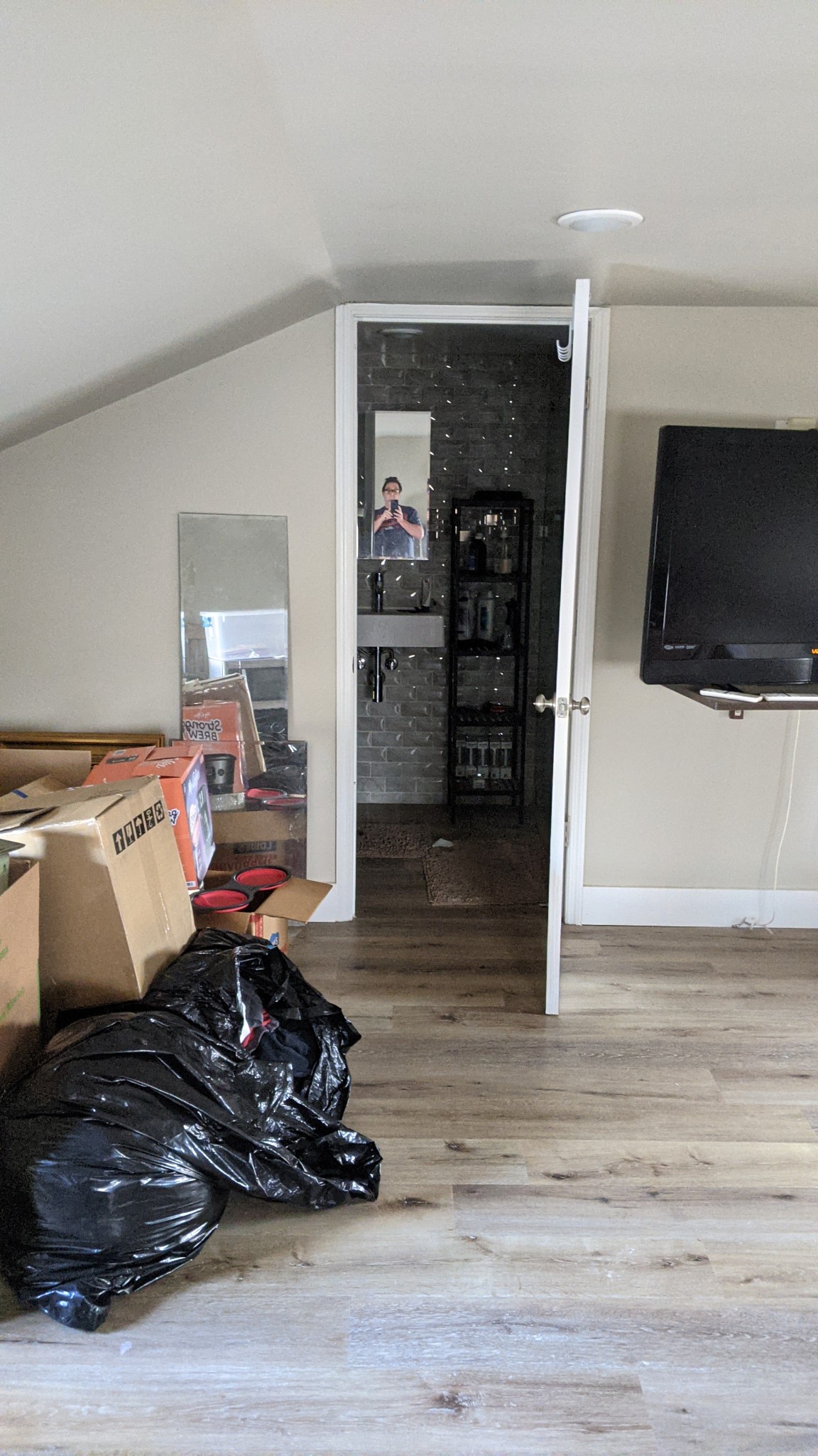150 Sylvis Road Dickson, TN 37055 - Photo 30 of 61 a living room with furniture and a flat screen tv