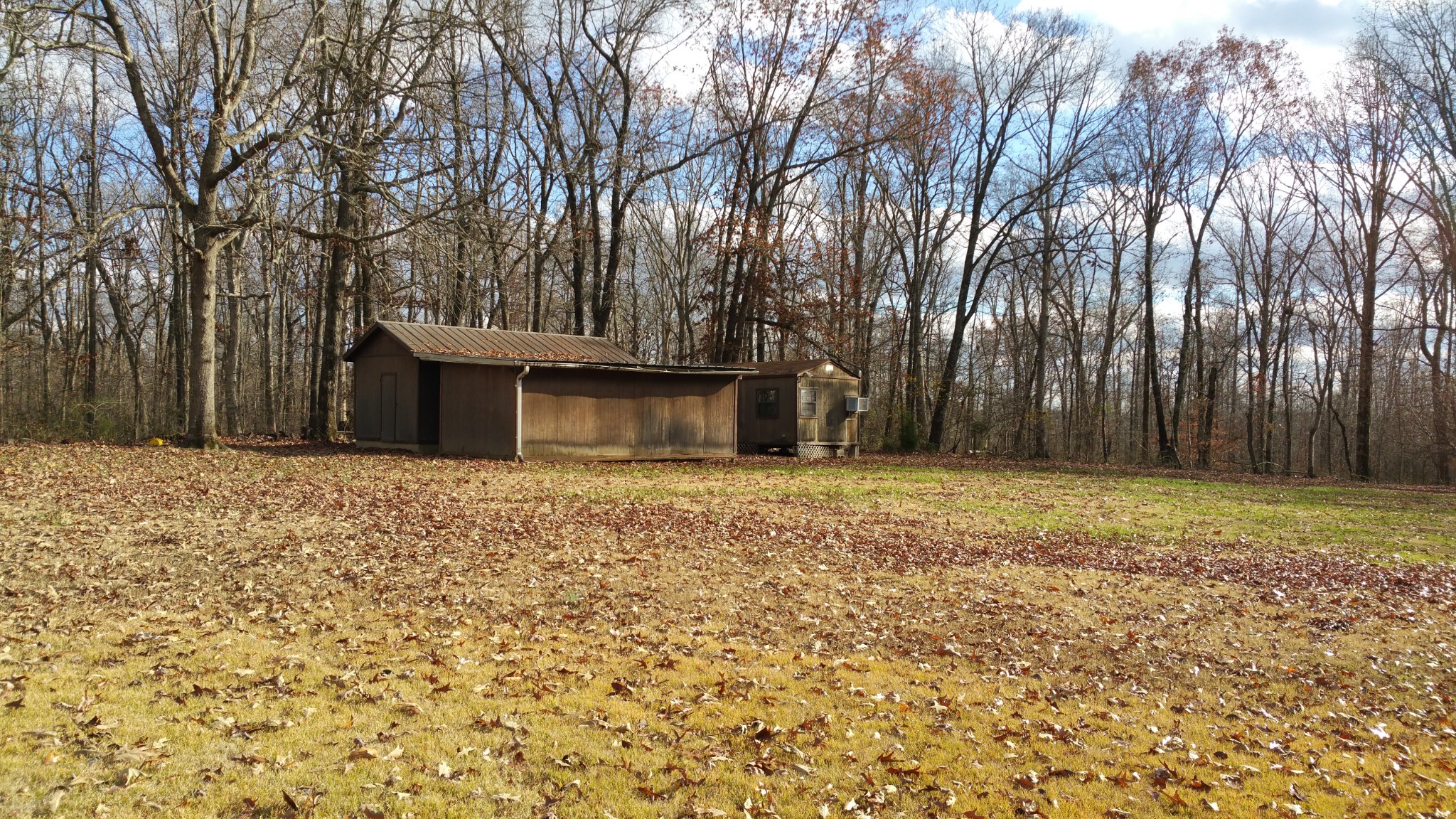 150 Sylvis Road Dickson, TN 37055 - Photo 55 of 61 a backyard of a house with large trees