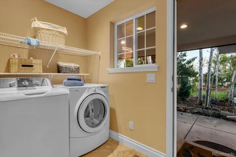 a view of a livingroom with furniture window and outside view