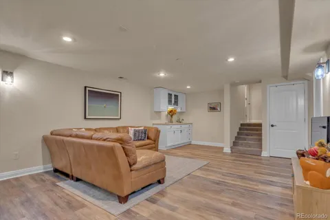 a kitchen with a sink and a refrigerator