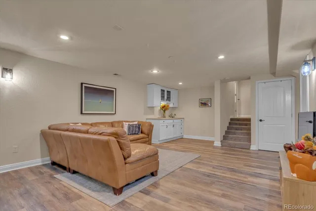 a kitchen with a sink and a refrigerator