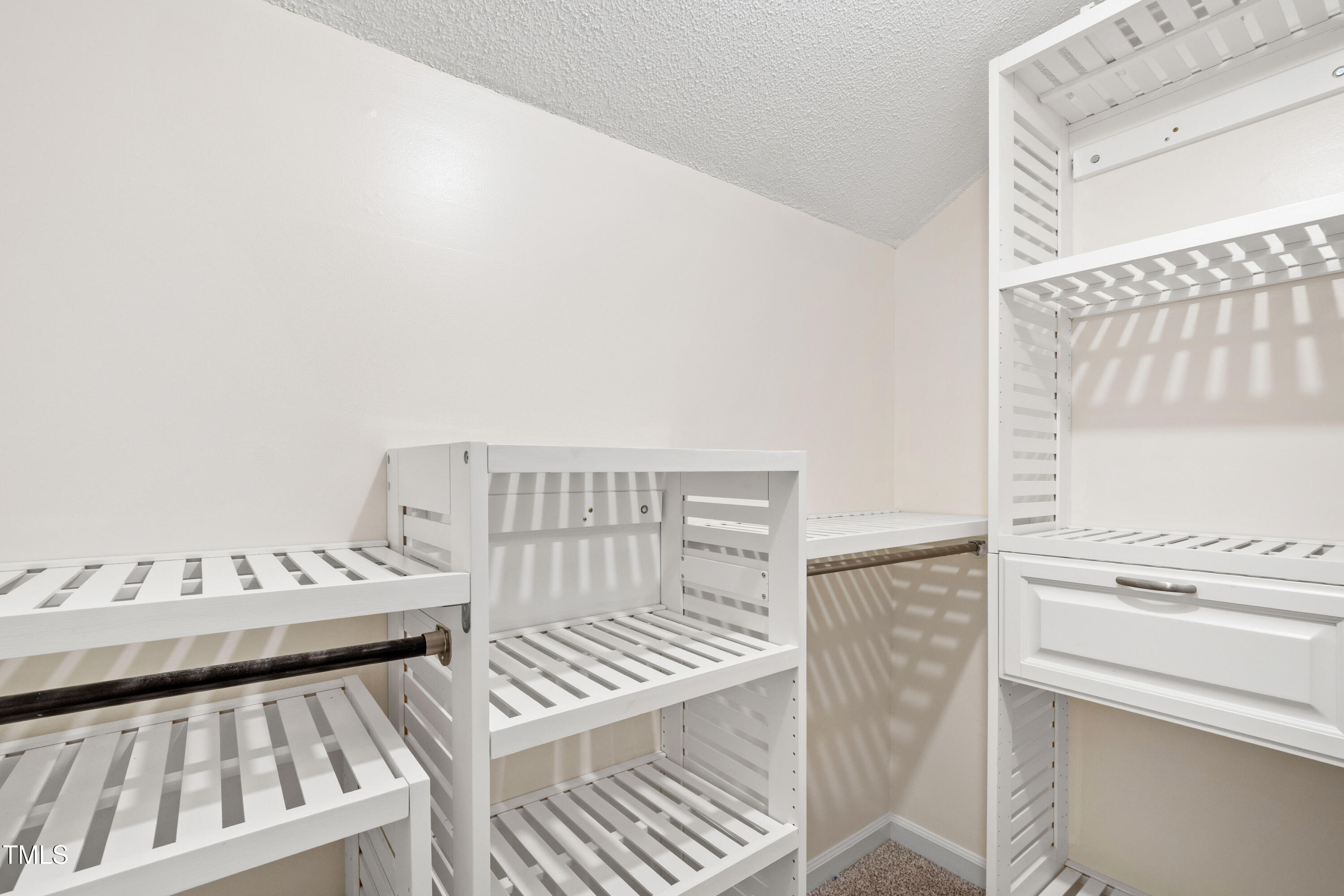 115 Inverness Court Cary, NC 27511 - Photo 18 of 40 a view of a bedroom with furniture and staircase