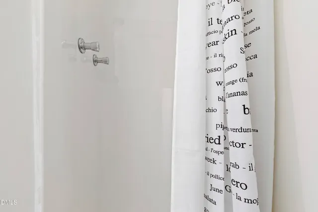 a view of a deck with table and chairs and wooden floor