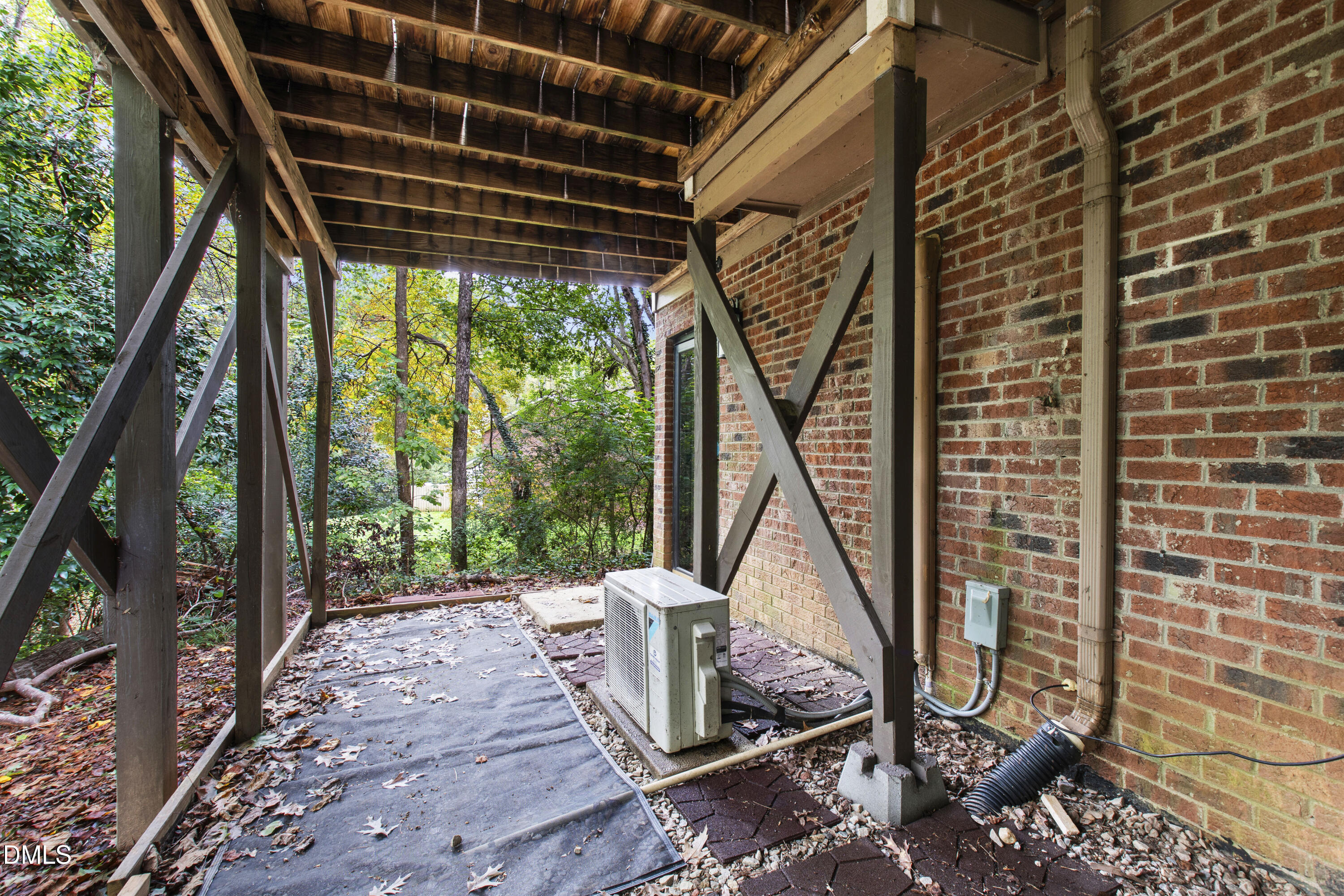 115 Inverness Court Cary, NC 27511 - Photo 38 of 40 a view of a couches chair and fire pit in the backyard of a house