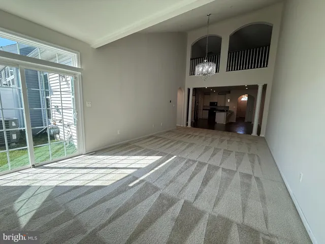 a view of a livingroom with a staircase