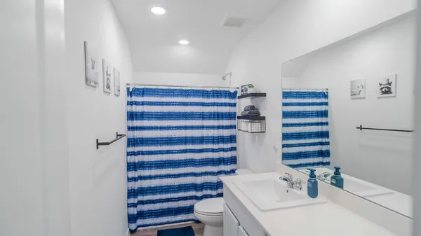 a bathroom with a sink and a toilet