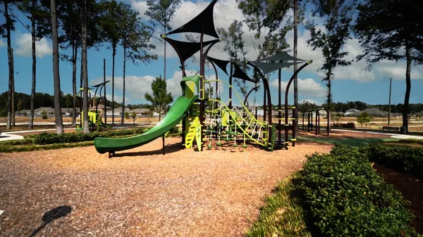 an ocean view with outdoor seating