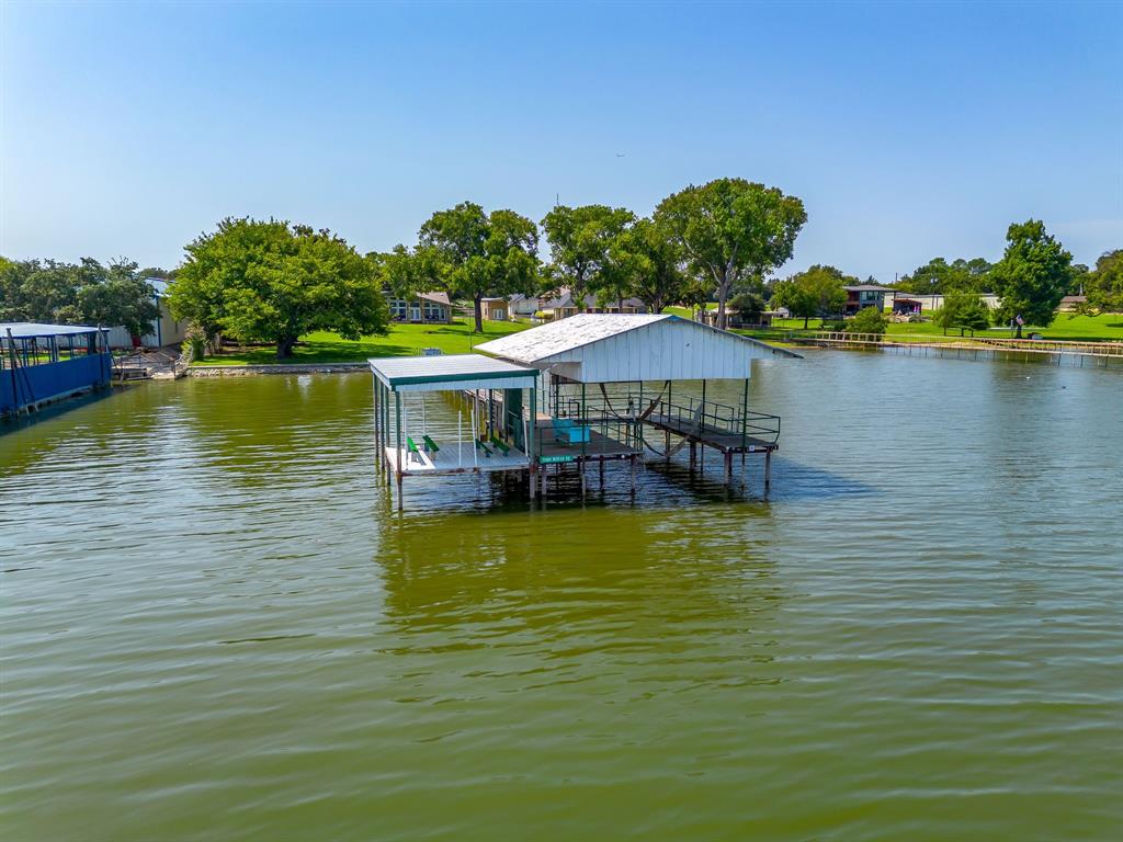 11484 Moran Road Azle, TX 76020 - Photo 36 of 40 Dock featuring boat lift and a water view