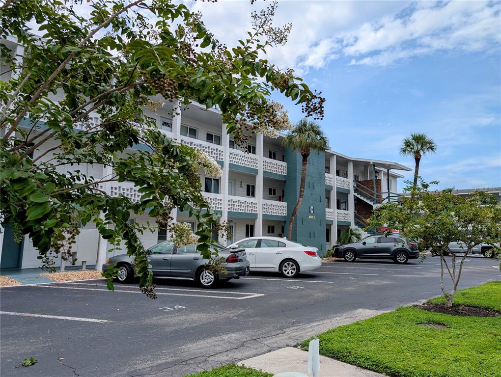 5908 17th Street West, Unit C36 Bradenton, FL 34207 - Photo 1 of 28 a car parked in front of a house