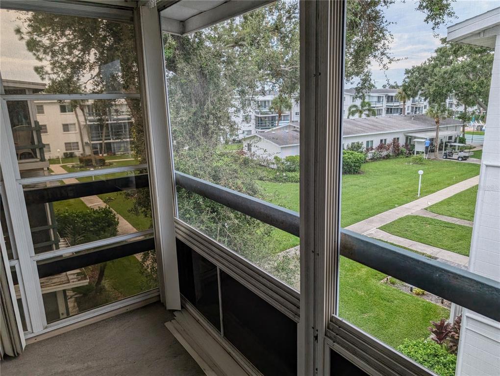 5908 17th Street West, Unit C36 Bradenton, FL 34207 - Photo 18 of 28 a view of a two chair in the balcony