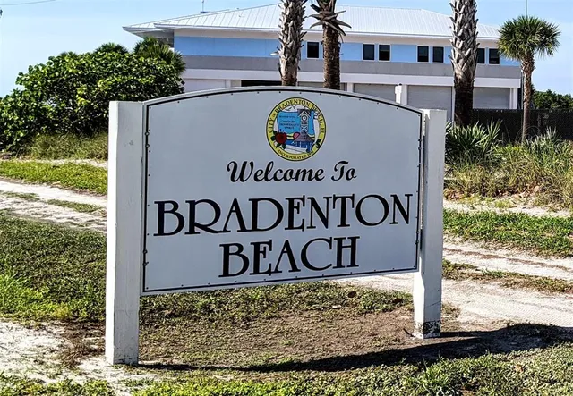 a sign broad on the side of the road