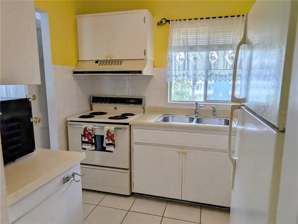 a utility room with washer and dryer