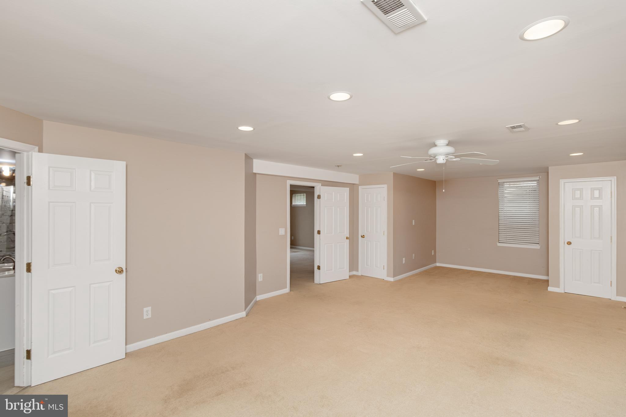 6239 Willowfield Way Springfield, VA 22150 - Photo 15 of 45 a view of an empty room with a window