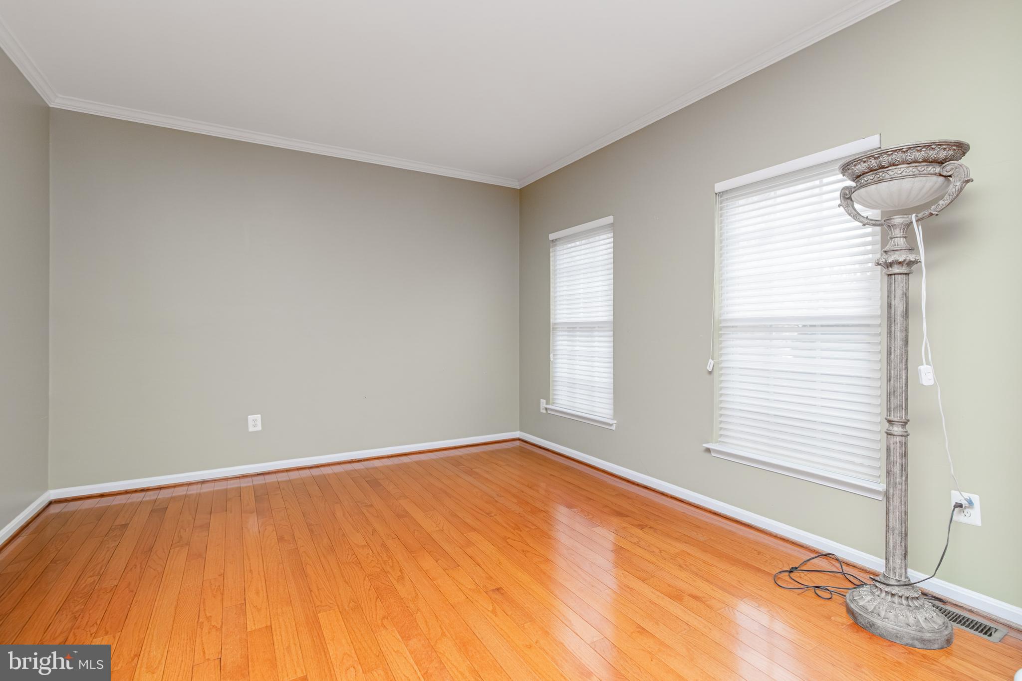 6239 Willowfield Way Springfield, VA 22150 - Photo 21 of 45 a view of an empty room with a window
