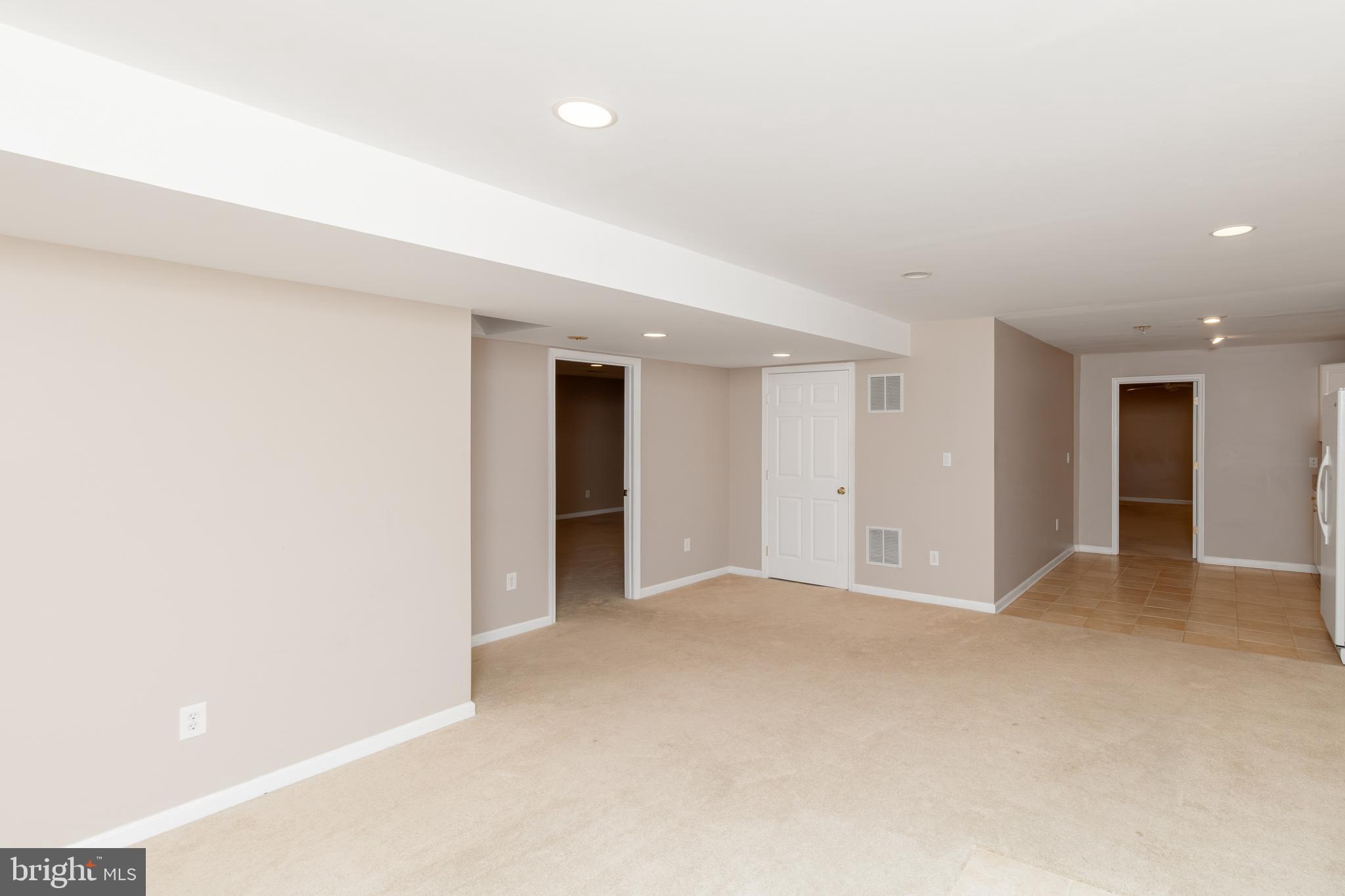 6239 Willowfield Way Springfield, VA 22150 - Photo 40 of 45 a view of an empty room with closet and a window