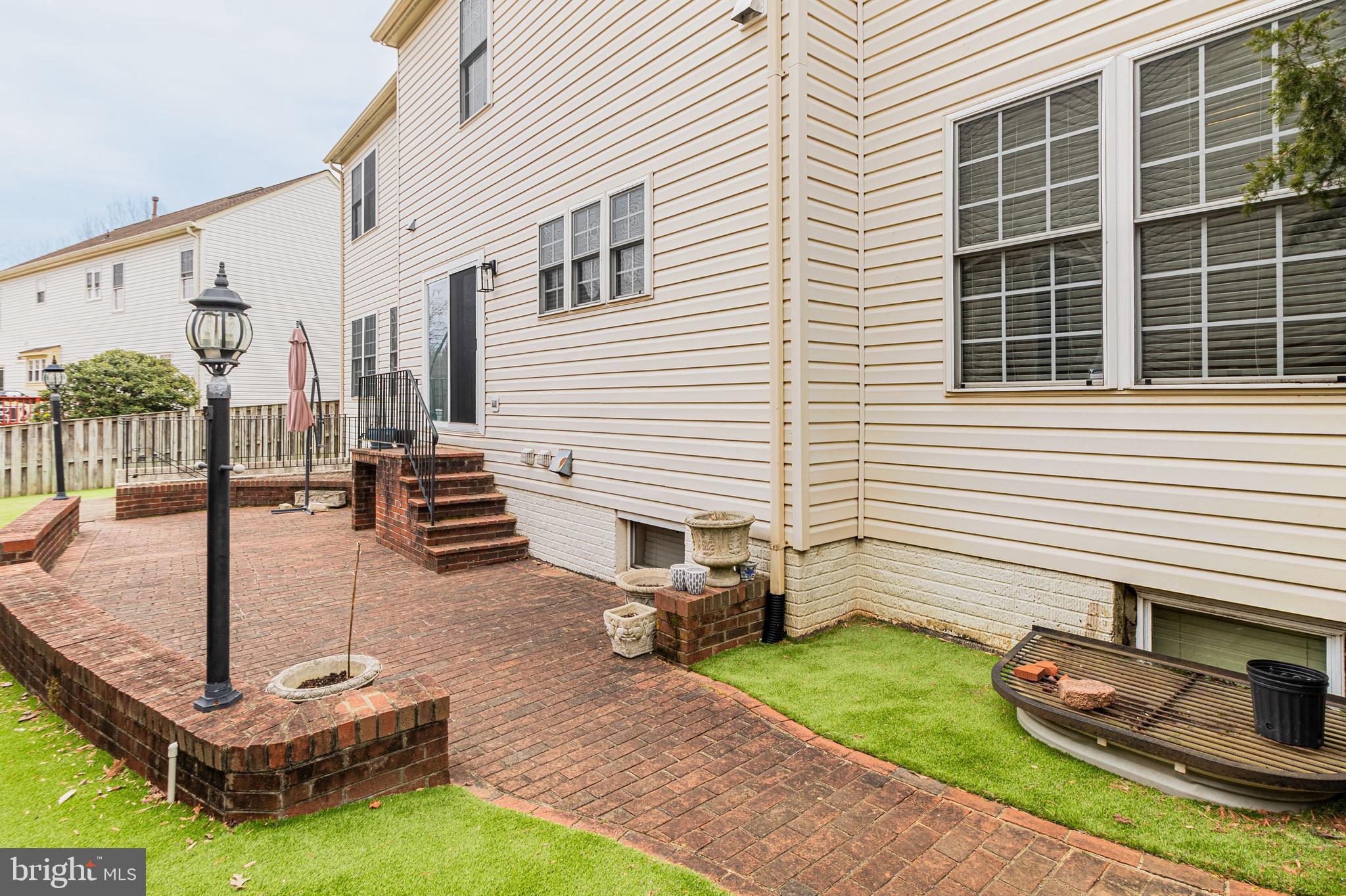 6239 Willowfield Way Springfield, VA 22150 - Photo 4 of 45 a front view of a house with garden