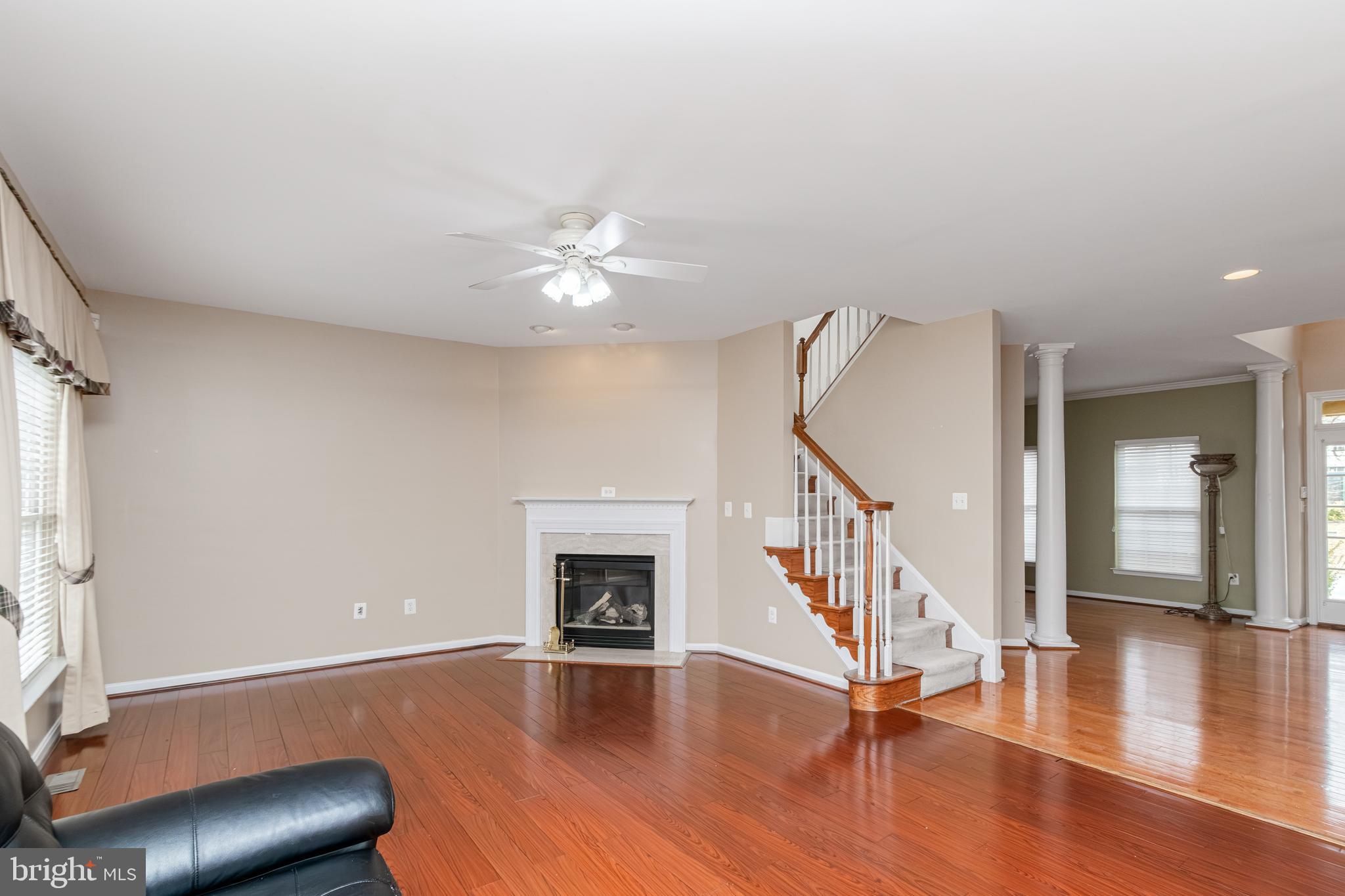 6239 Willowfield Way Springfield, VA 22150 - Photo 9 of 45 a view of livingroom with furniture and wooden floor