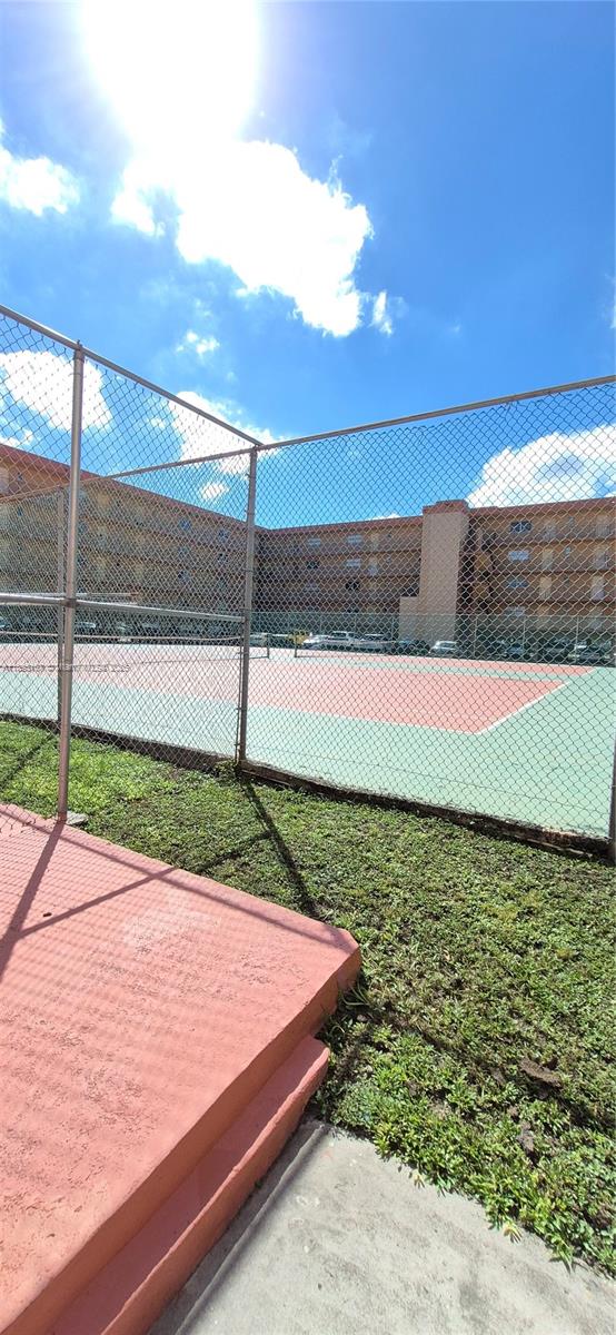 1850 West 56th Street, Unit 2410 Hialeah, FL 33012 - Photo 3 of 12 a view of a backyard