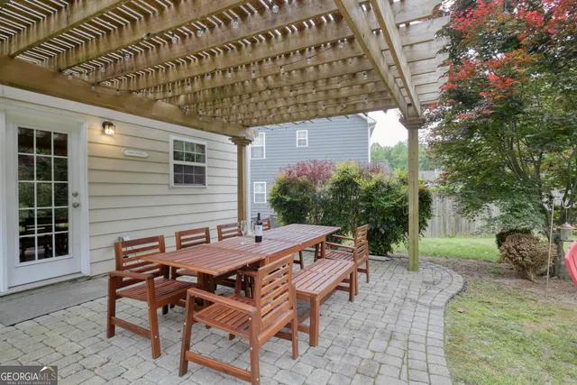 a backyard of a house with seating space