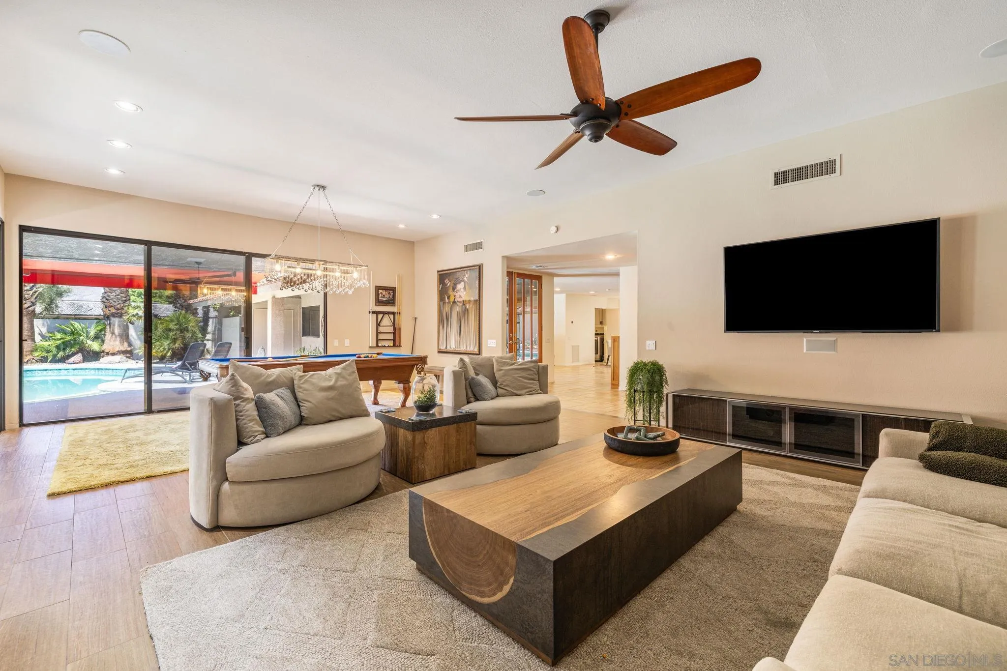 142 Yale Drive Rancho Mirage, CA 92270 - Photo 13 of 72 a living room with furniture and a flat screen tv