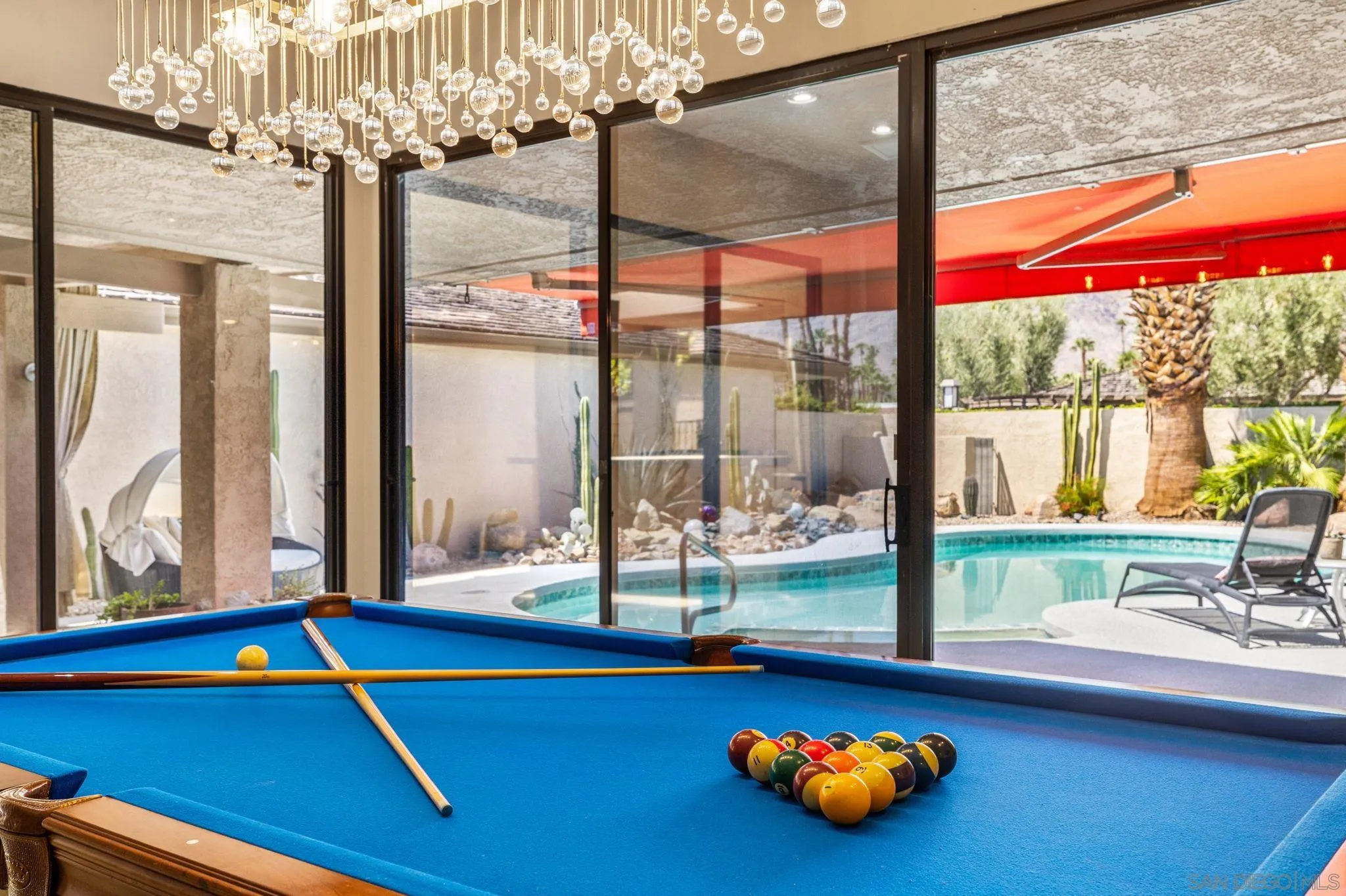 142 Yale Drive Rancho Mirage, CA 92270 - Photo 17 of 72 a room with pool table and windows