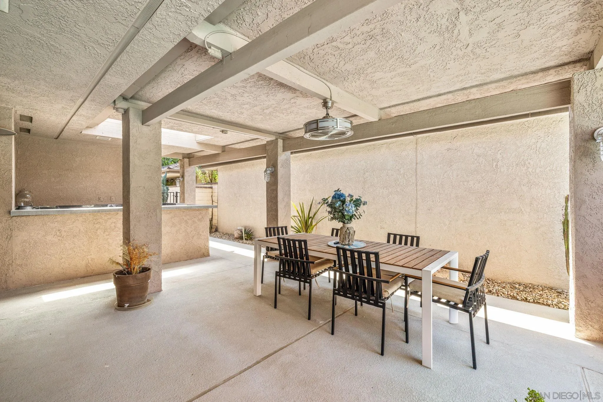 142 Yale Drive Rancho Mirage, CA 92270 - Photo 20 of 72 a view of a dining room with furniture and a chandelier