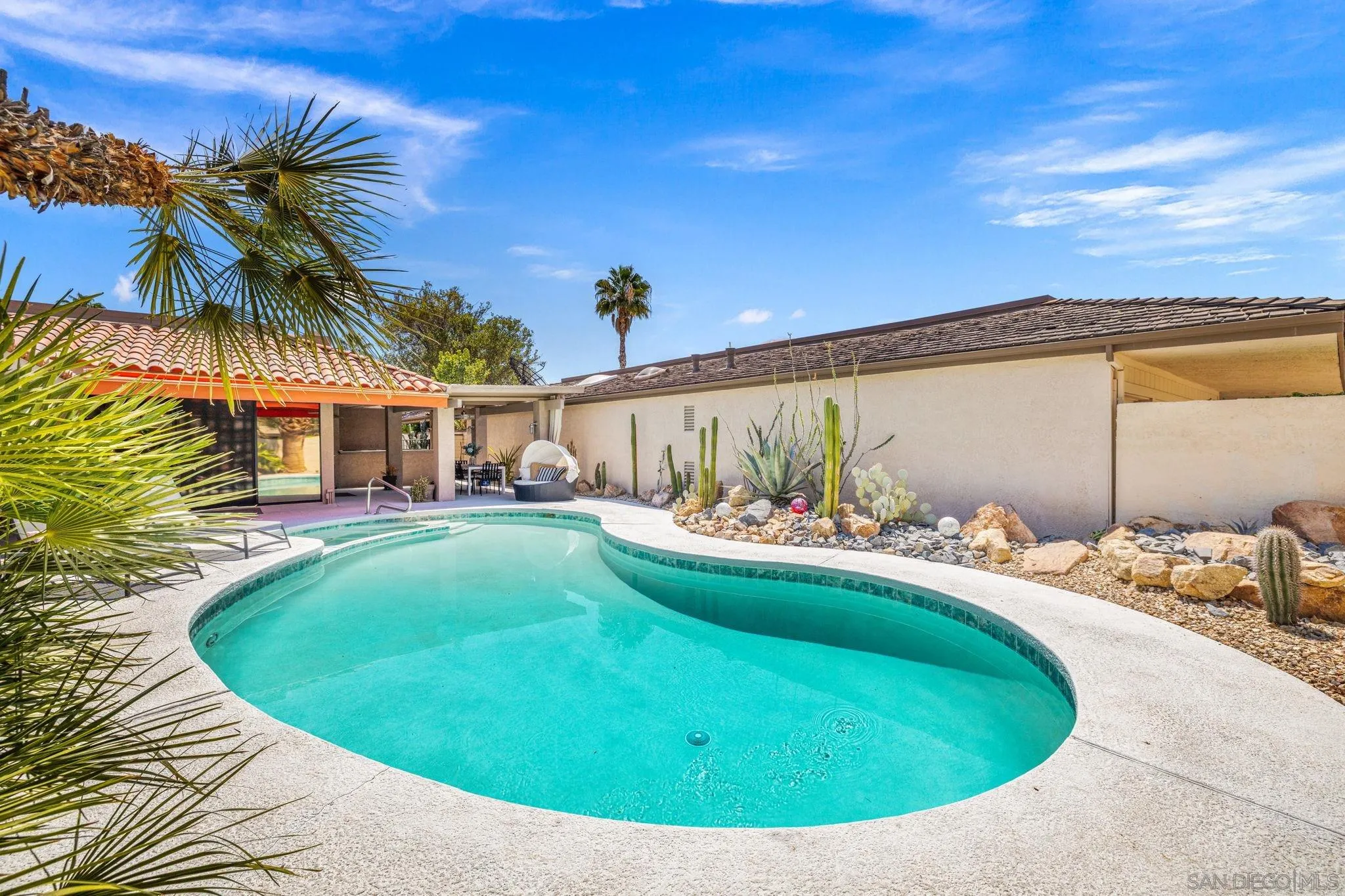 142 Yale Drive Rancho Mirage, CA 92270 - Photo 28 of 72 a view of a swimming pool with a patio