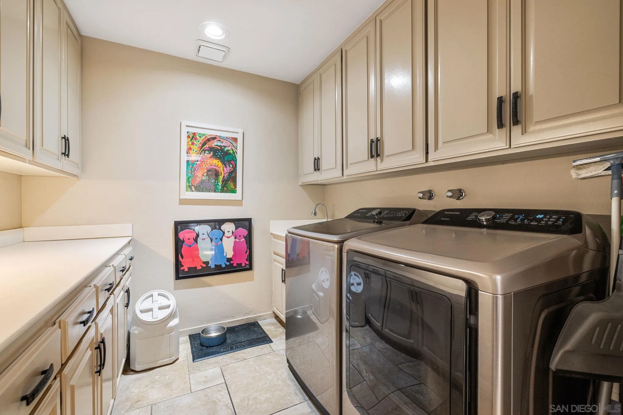 142 Yale Drive Rancho Mirage, CA 92270 - Photo 37 of 72 a utility room with stainless steel appliances a stove a microwave and cabinets