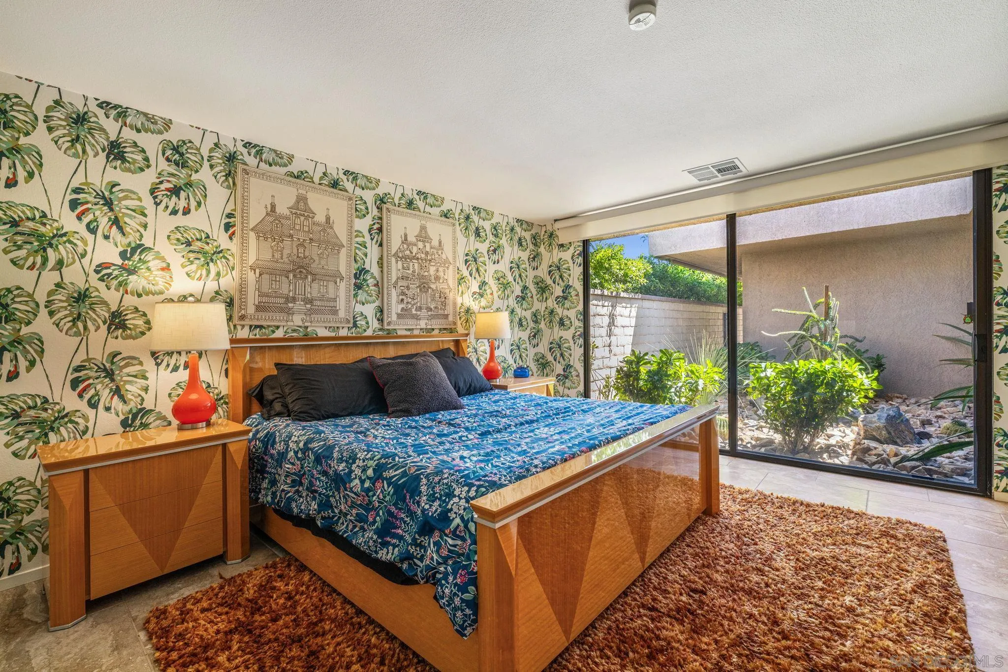 142 Yale Drive Rancho Mirage, CA 92270 - Photo 41 of 72 a bed sitting in a bedroom next to a window