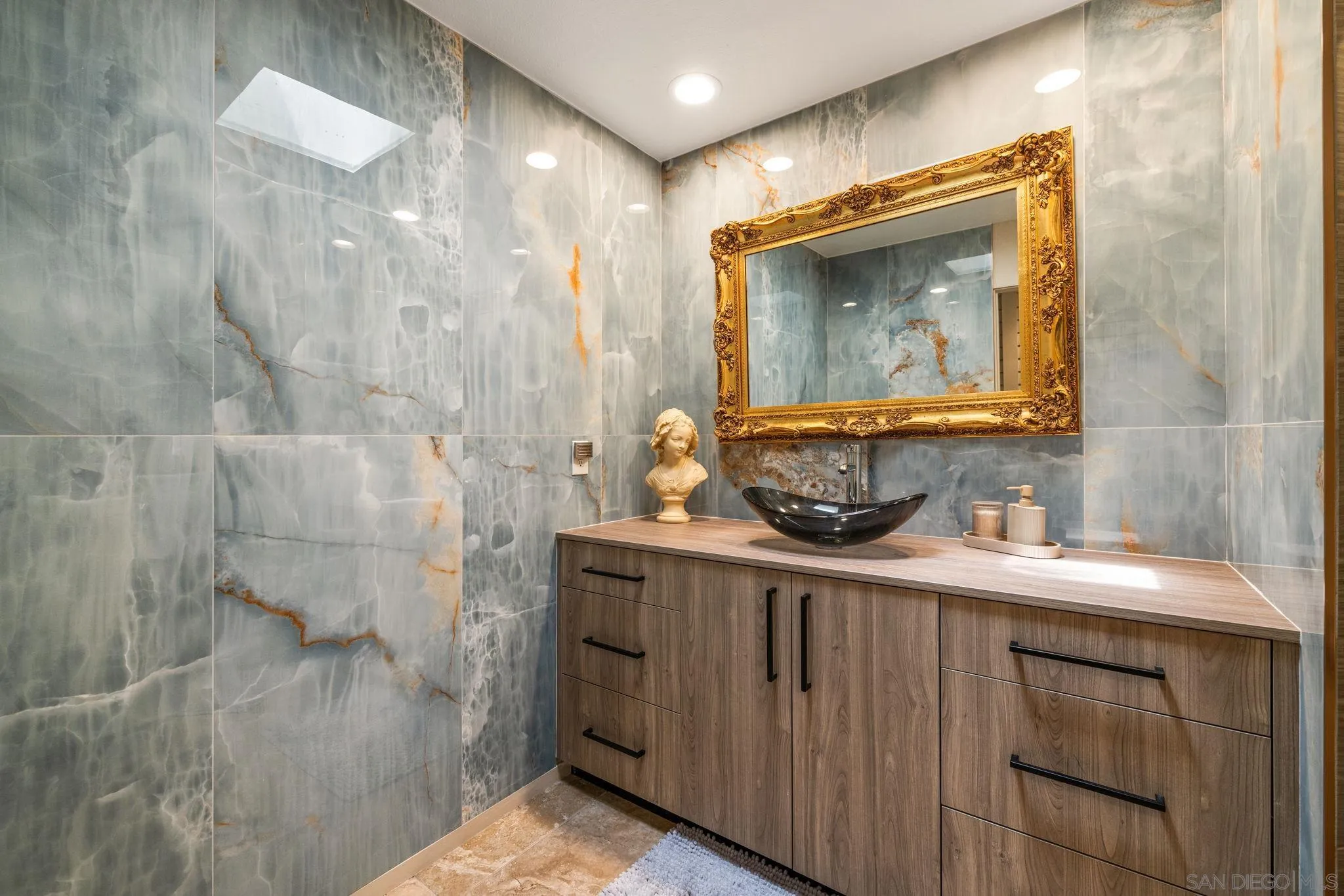 142 Yale Drive Rancho Mirage, CA 92270 - Photo 44 of 72 a bathroom with a sink a mirror and shower
