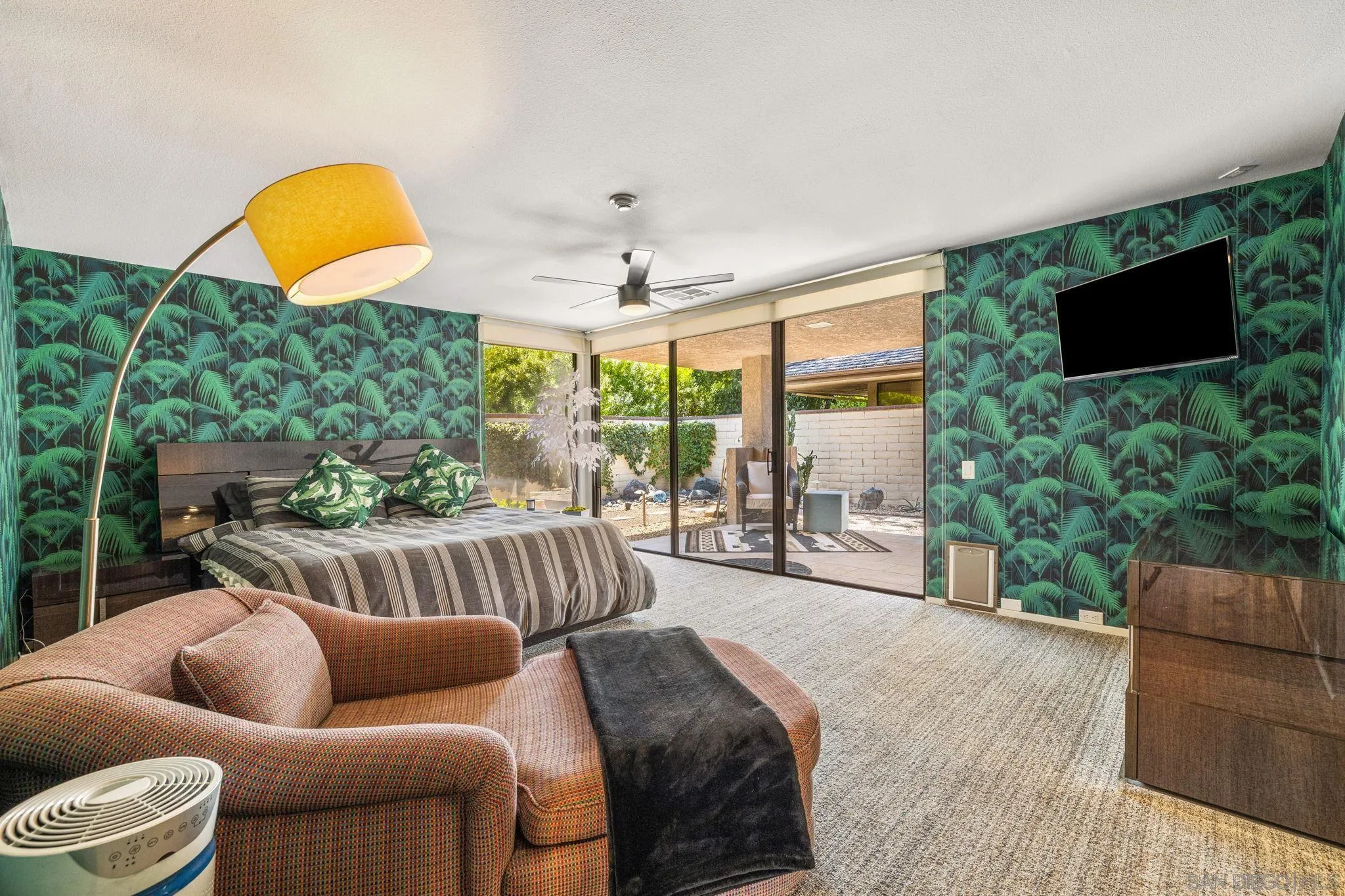 142 Yale Drive Rancho Mirage, CA 92270 - Photo 46 of 72 a bedroom with furniture and a flat screen tv