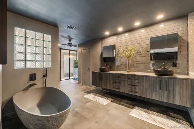 a view of a swimming pool with a yard