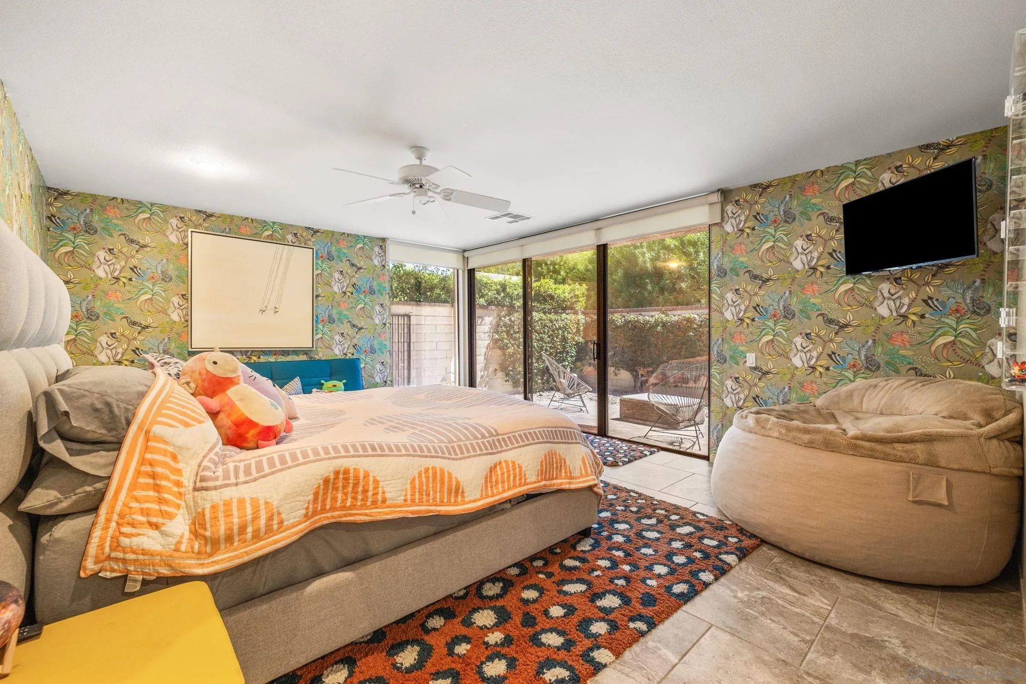 142 Yale Drive Rancho Mirage, CA 92270 - Photo 57 of 72 a bedroom with a bed and wooden floor