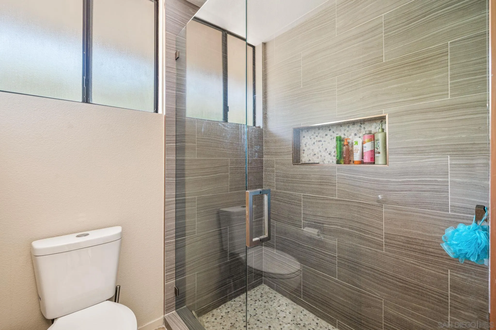 142 Yale Drive Rancho Mirage, CA 92270 - Photo 61 of 72 a bathroom with a toilet and a shower